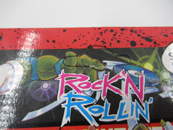 Teenage Mutant Ninja Turtles Rock 'N Rollin' Classic Rocker Leo 4.5" Figure TMNTs - Playmates (1991)