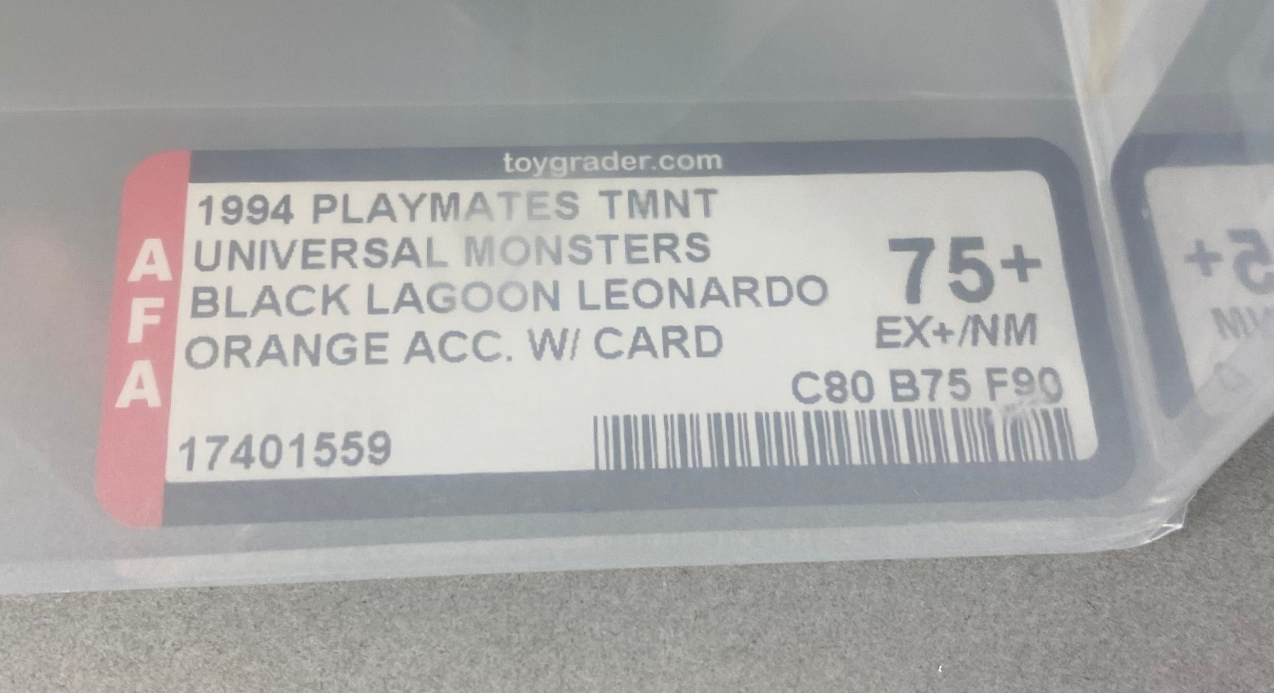 A graded Teenage Mutant Ninja Turtles action figure. Leonardo as Universal Monsters Creature From the Black Lagoon AFA 75+.  Label photo close-up.