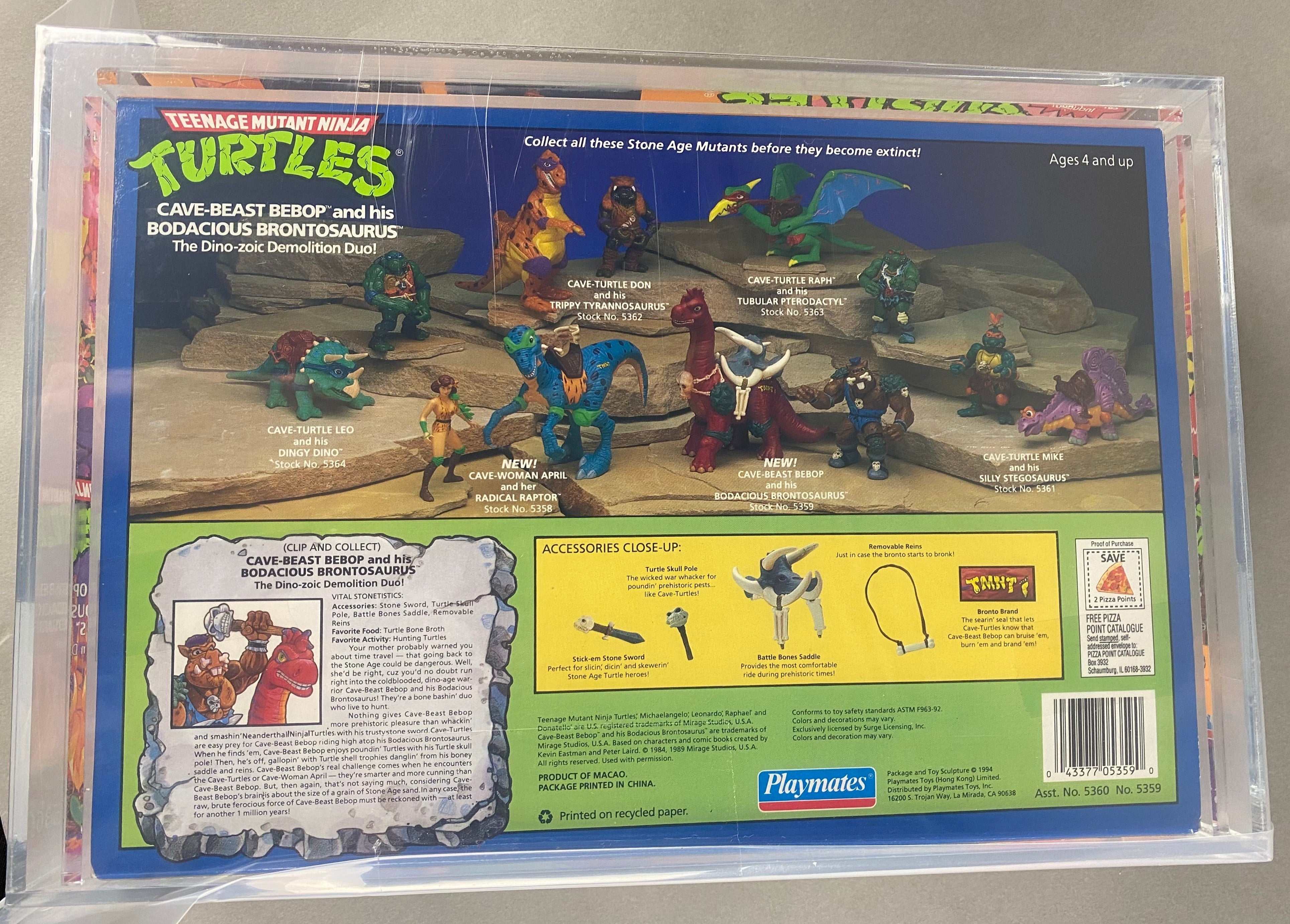Teenage Mutant Ninja Turtles Cave-Beast Bebop and his Bodacious Brontosaurus Boxed Figure graded AFA 80. Back photo.