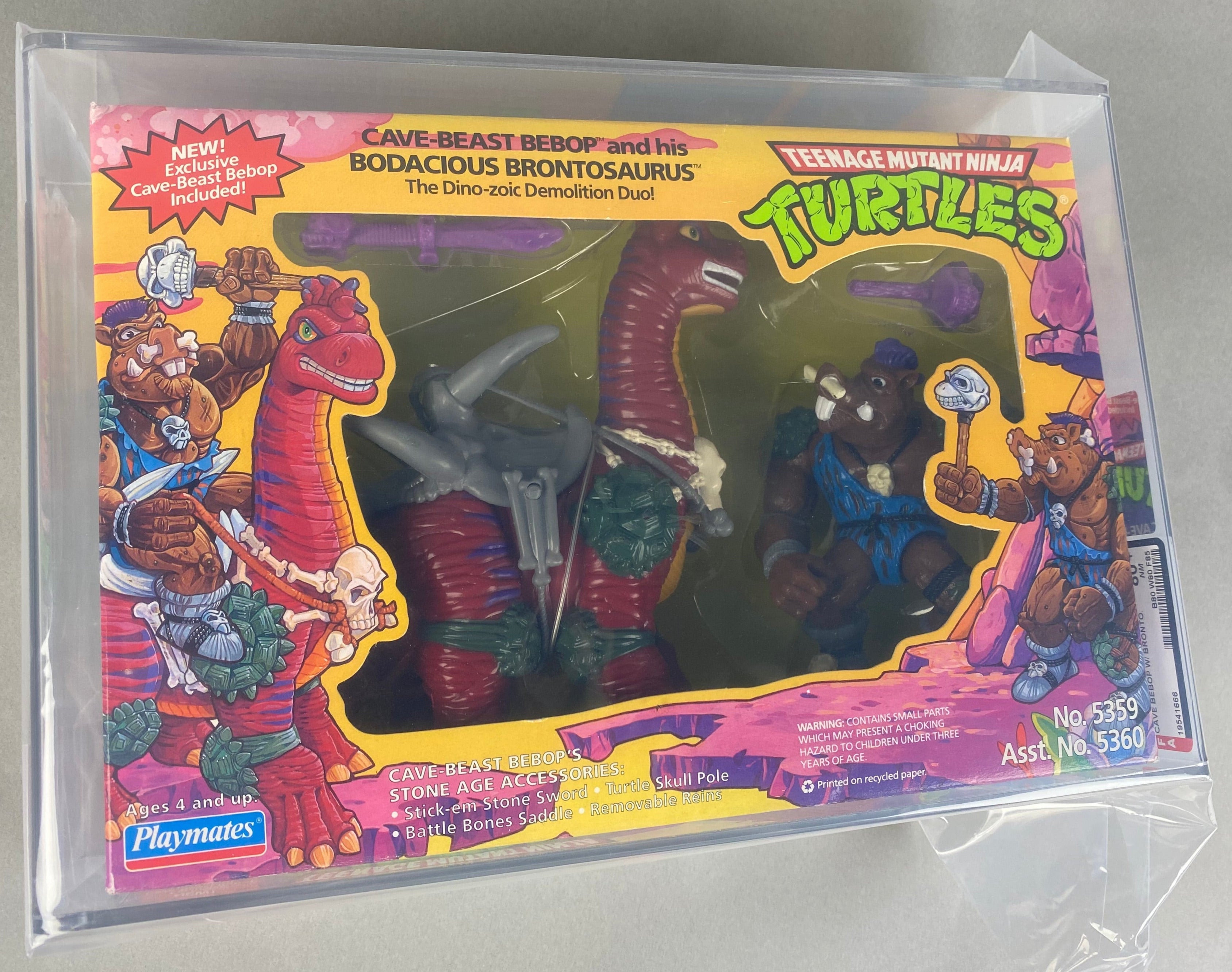 Teenage Mutant Ninja Turtles Cave-Beast Bebop and his Bodacious Brontosaurus Boxed Figure graded AFA 80. Front photo.