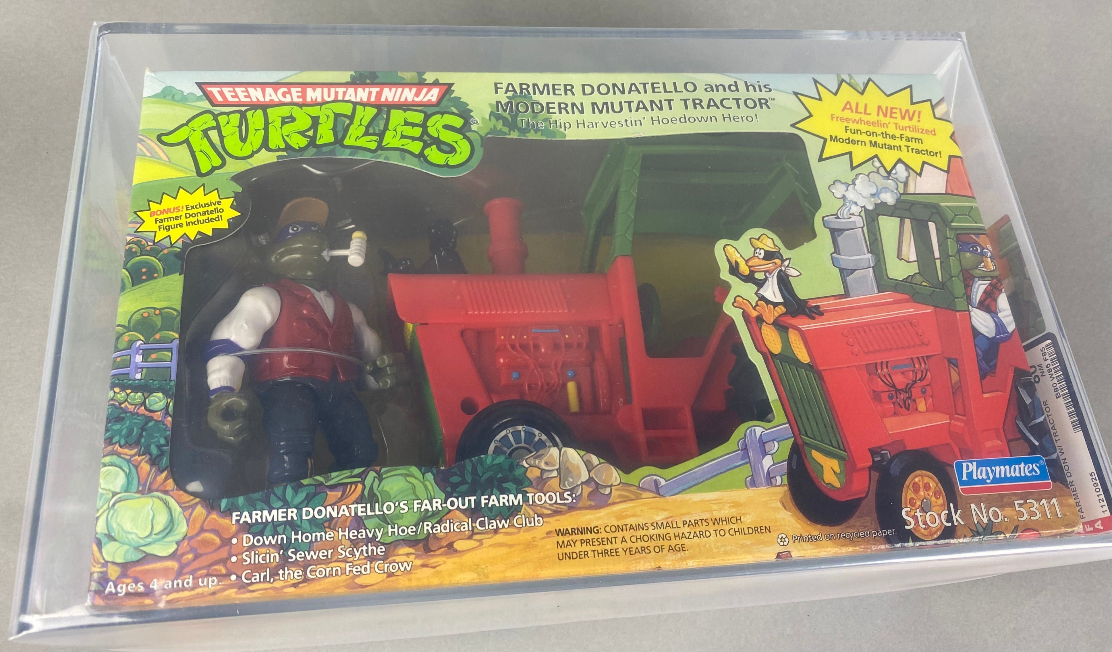 Teenage Mutant Ninja Turtles Farmer Donatello and his Modern Mutant Tractor boxed figure AFA graded 80. Front photo.