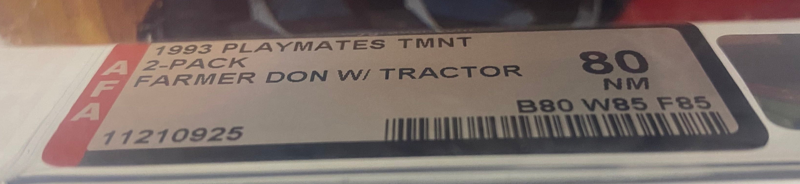 Teenage Mutant Ninja Turtles Farmer Donatello and his Modern Mutant Tractor boxed figure AFA graded 80.  Label photo close-up.