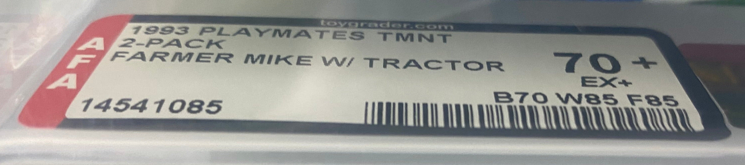 Teenage Mutant Ninja Turtles Farmer Mike and his Turtle Tractor boxed figure AFA graded 70+. Label photo close-up.