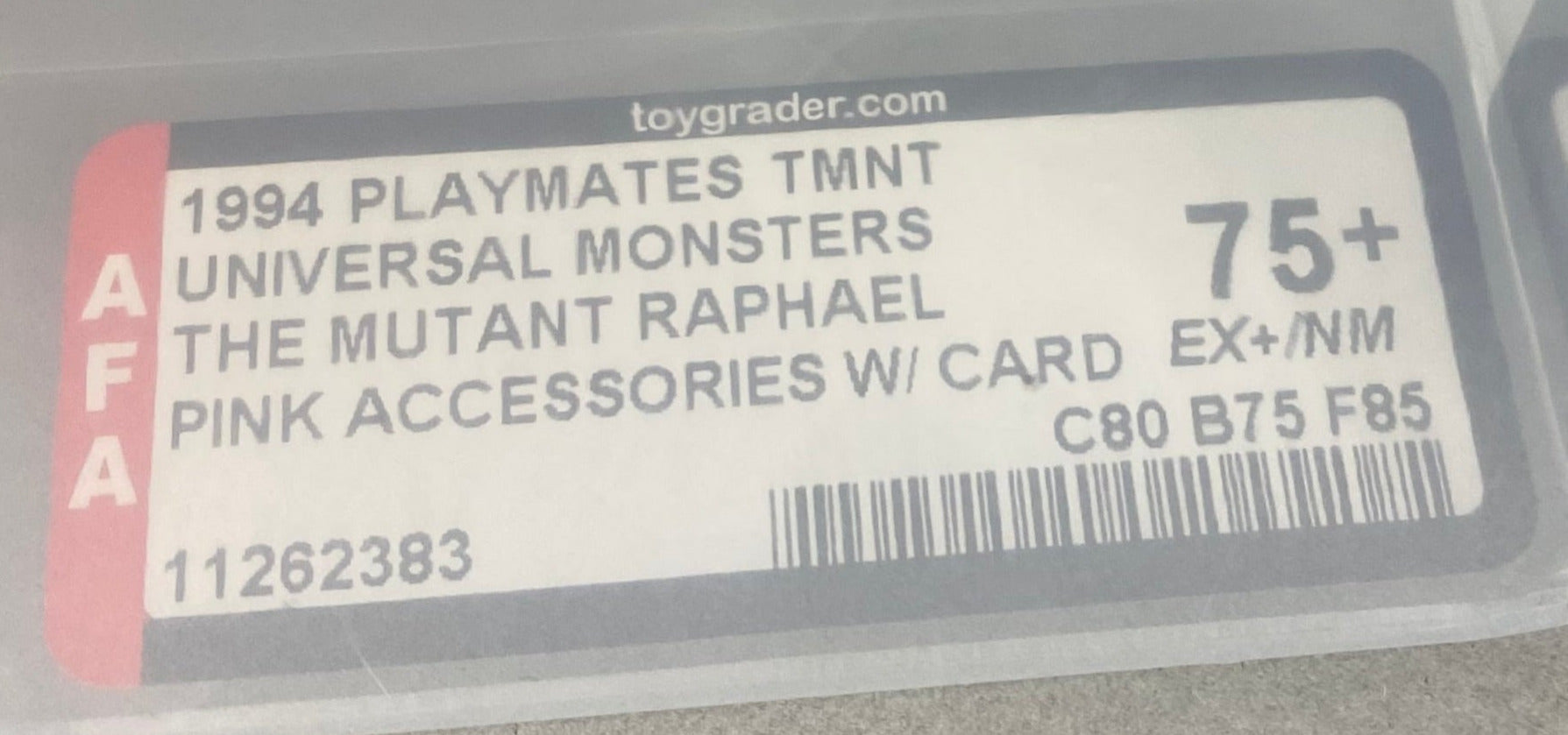 Teenage Mutant Ninja Turtles Raphael as The Mutant Universal Studios Monsters boxed figure AFA graded 75+.  Label photo close-up.