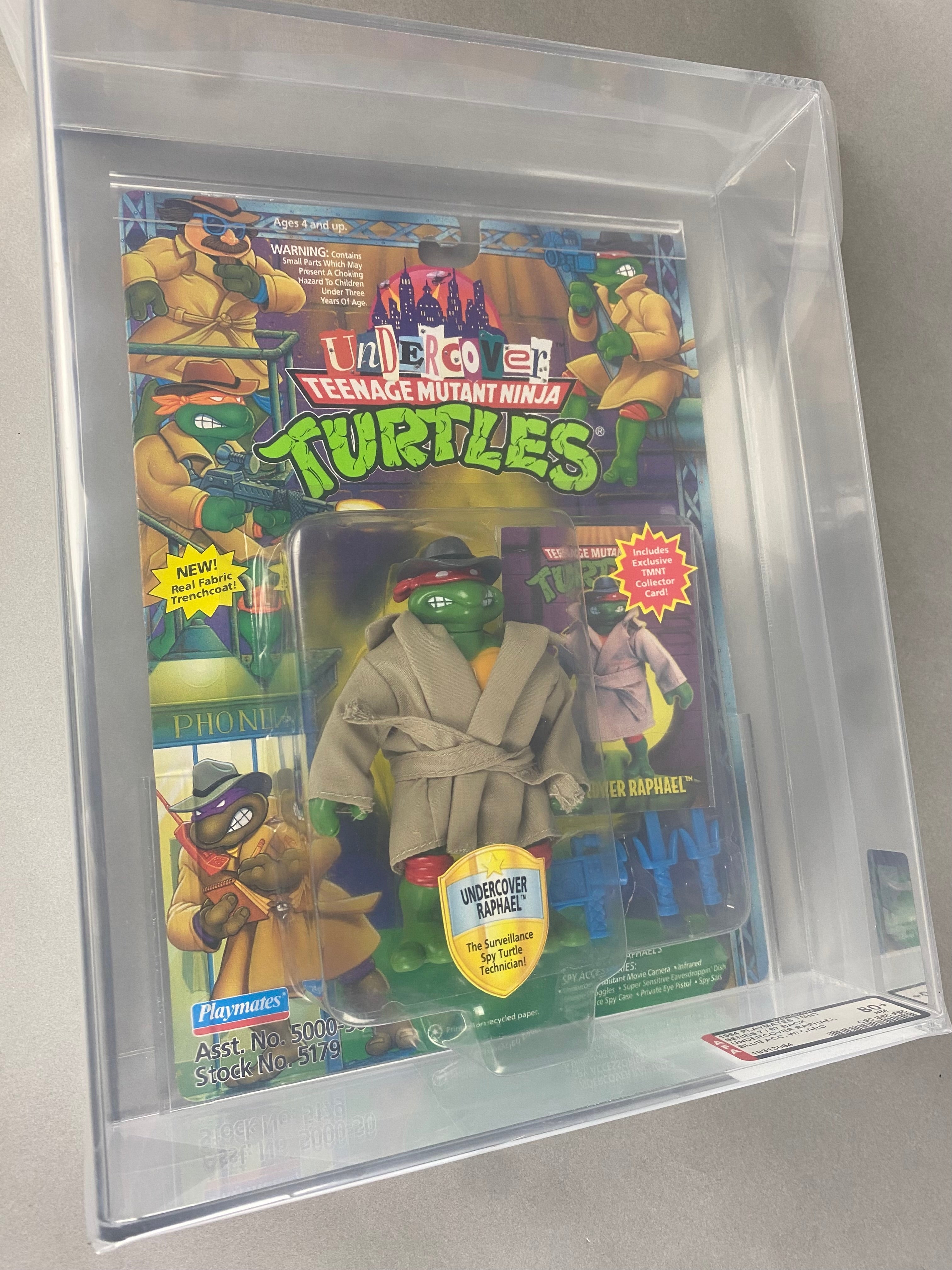 A Teenage Mutant Ninja Figure featuring Raphael from the Undercover series. The figure is graded AFA 80+. Front view.